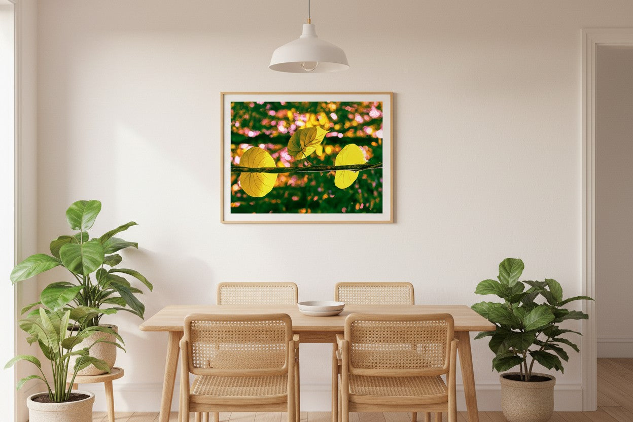Daintree Vine abstract botanical fine art print in a thin timber frame in a bright minimalist dining room with rattan chairs and indoor plants — unframed wall art