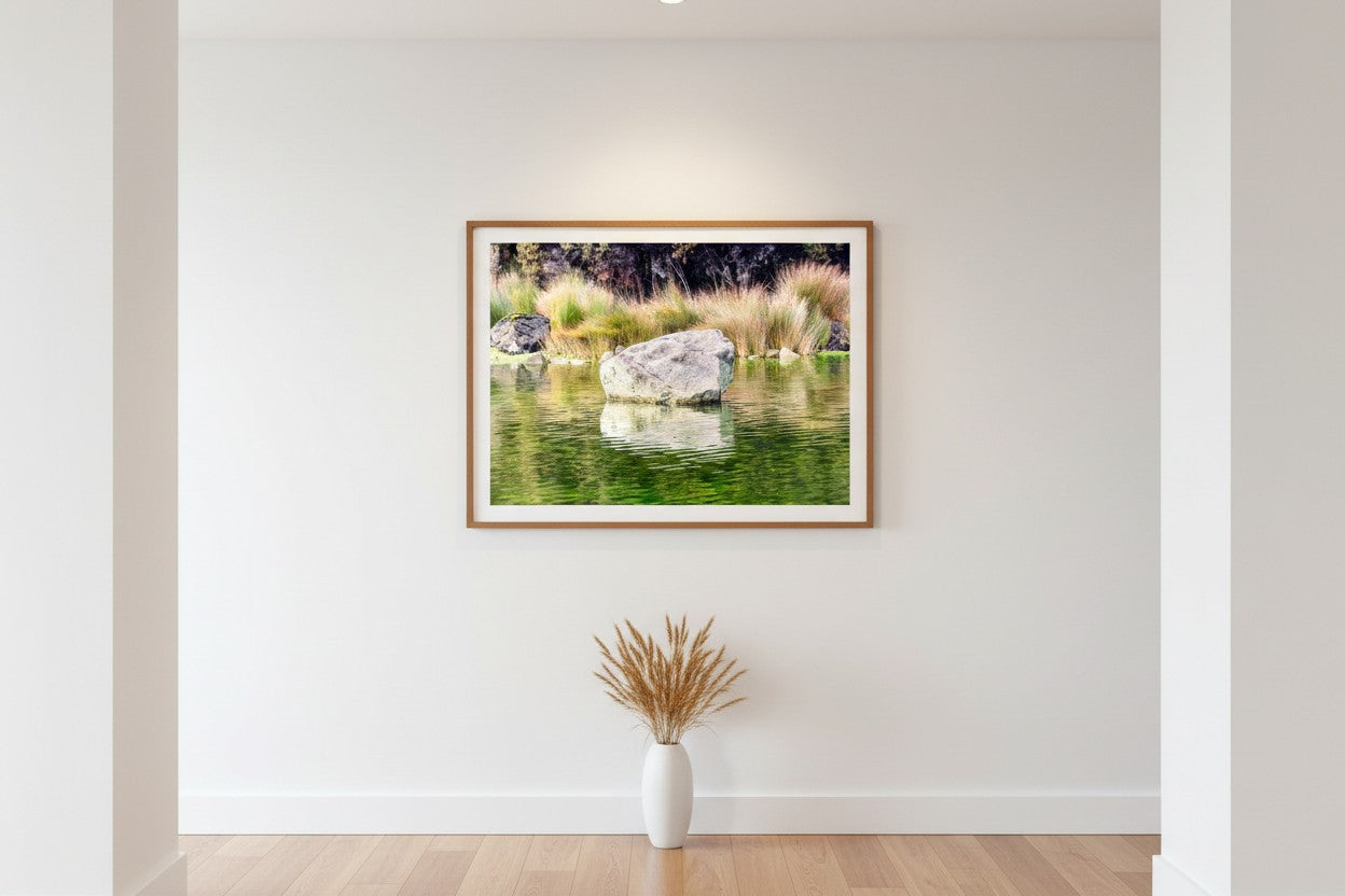 Kōhatu fine art print in a minimalist hallway with timber floors and dried tussock — unframed New Zealand river wall art