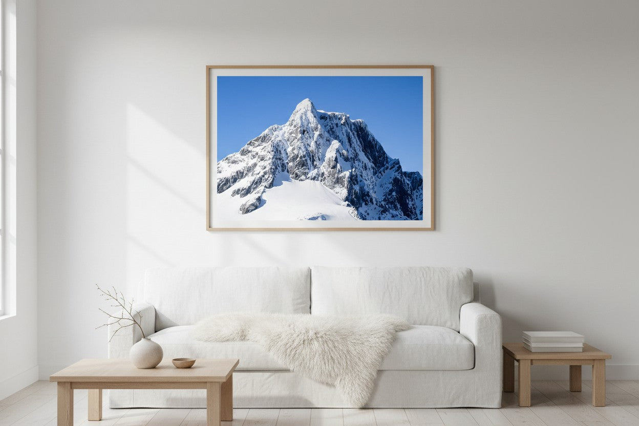 The Limit Mount Pembroke fine art print in a bright Scandinavian living room with oak furniture — unframed New Zealand wall art